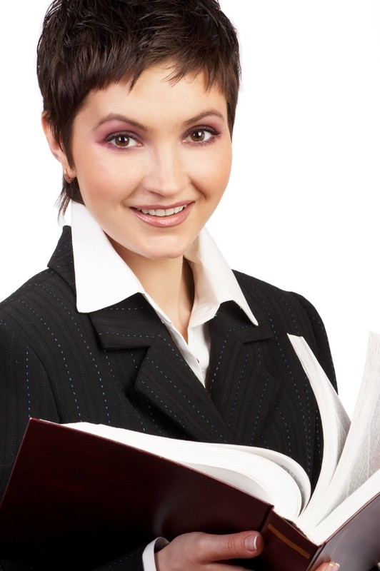 Image of teacher holding a book